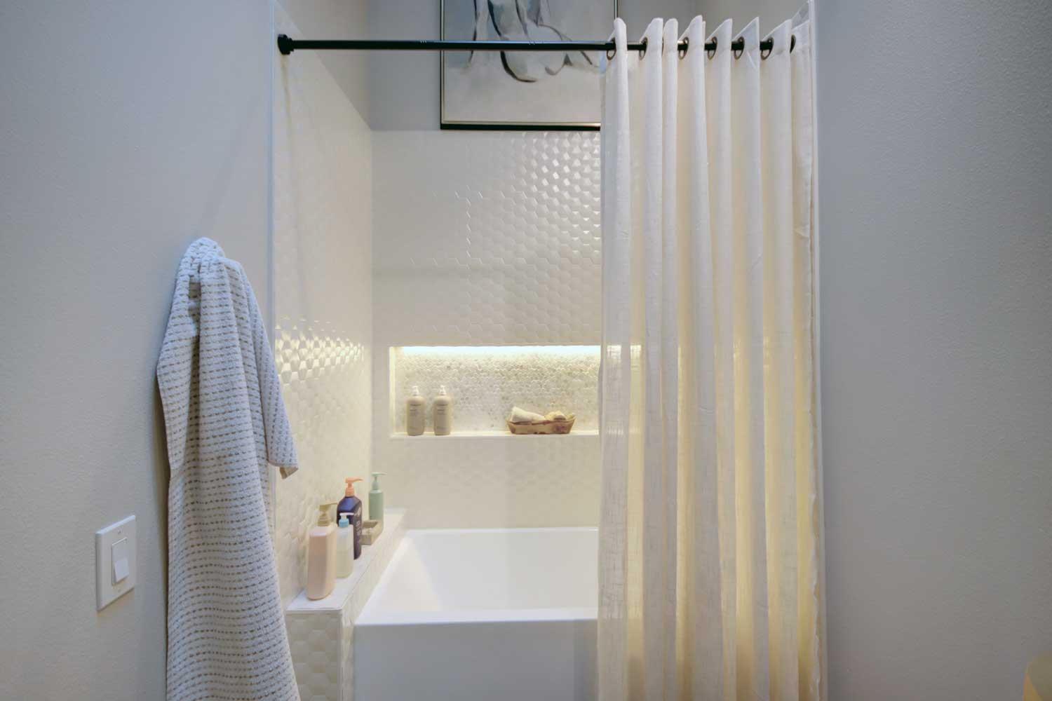 11418 Coloma Road Gold River, CA 95670 - Photo 29 of 40 a bathroom with a shower and a tub