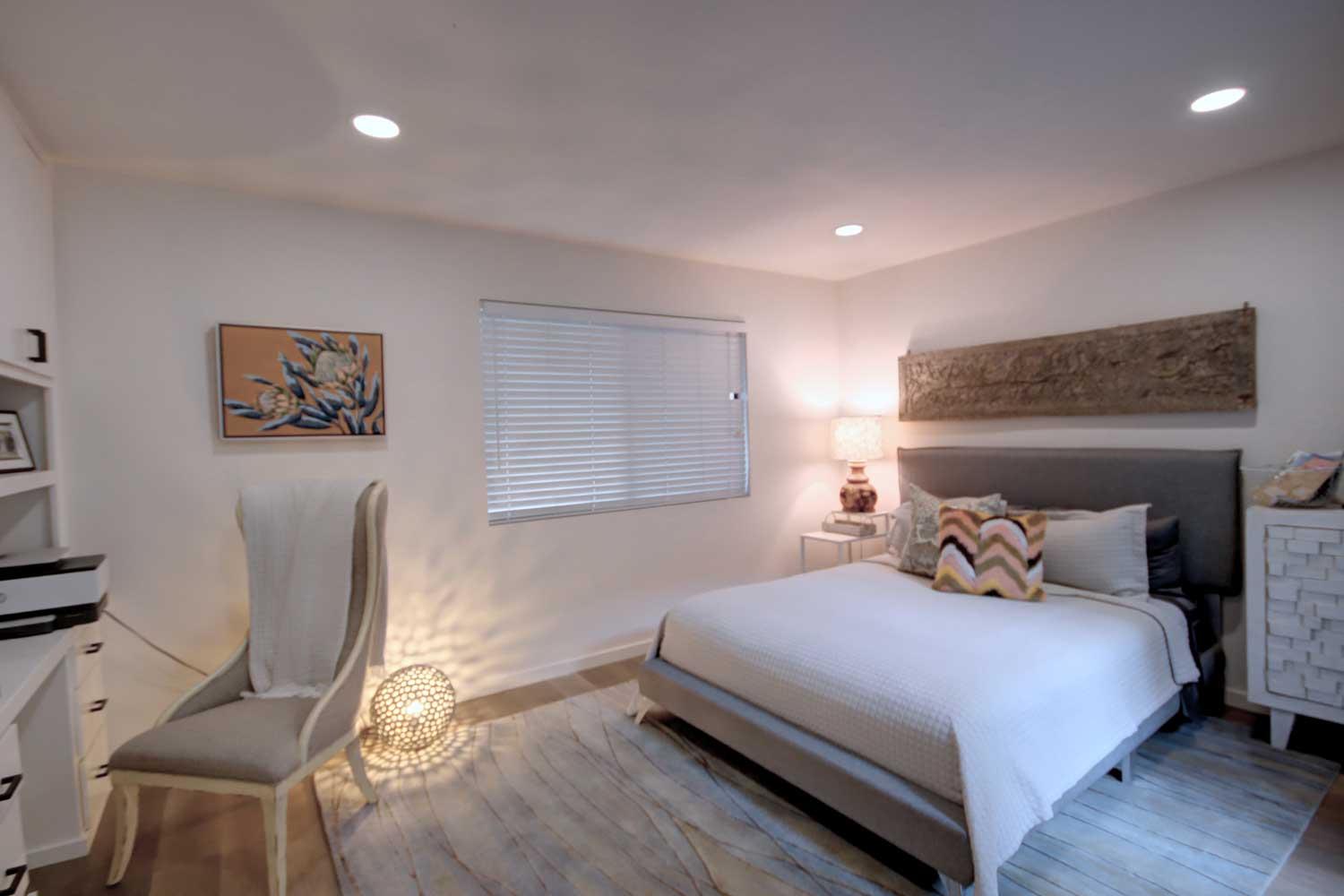 11418 Coloma Road Gold River, CA 95670 - Photo 38 of 40 a bedroom with a bed and a chair