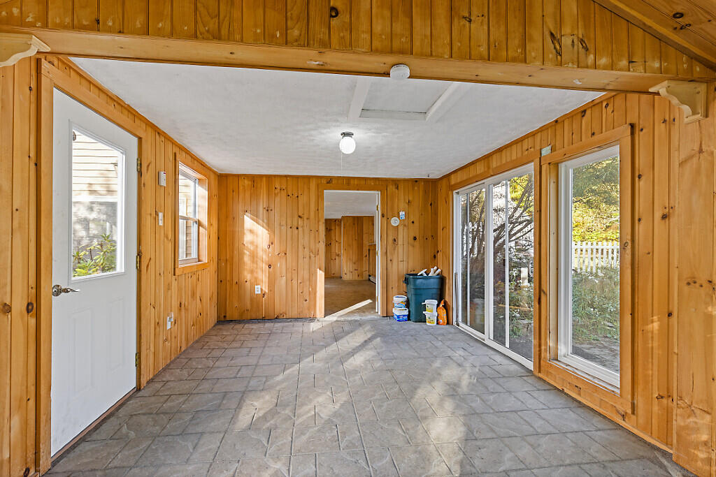 413 North Pond Road Winslow, ME 04901 - Photo 34 of 52 35 heated sunroom leads to patio