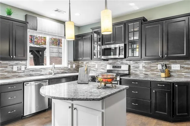 an aerial view of a house with outdoor space swimming pool and outdoor space