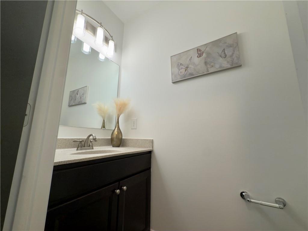 22 Watervine Court Dallas, GA 30132 - Photo 37 of 90 a bathroom with a sink and a mirror