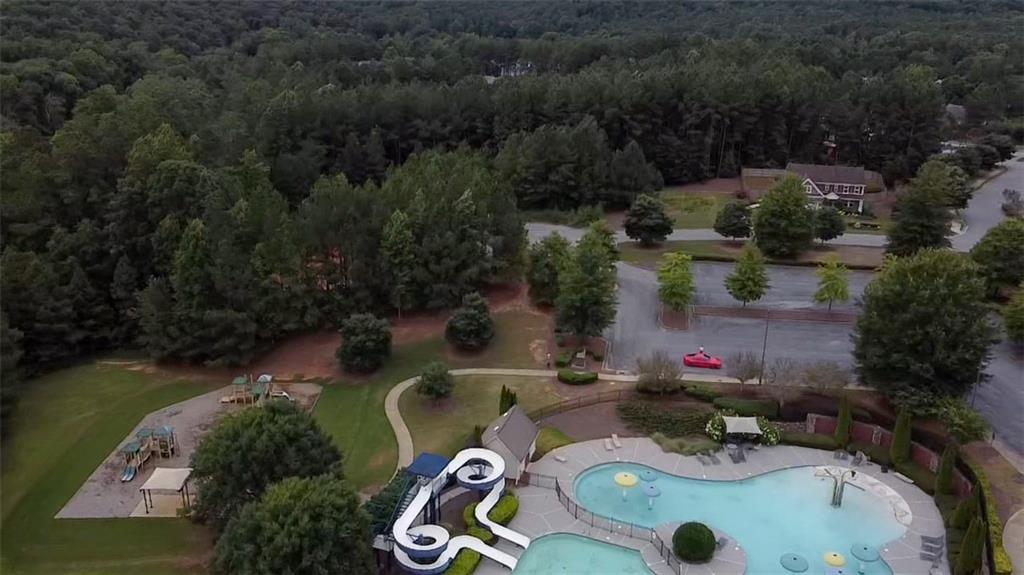 22 Watervine Court Dallas, GA 30132 - Photo 76 of 90 an aerial view of a house with swimming pool and outdoor seating