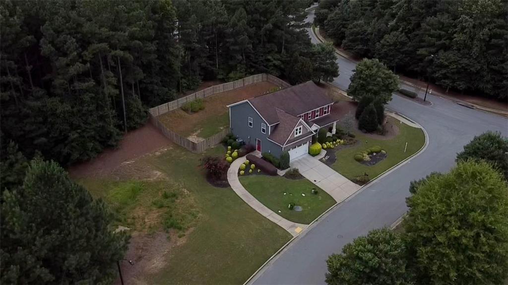 22 Watervine Court Dallas, GA 30132 - Photo 81 of 90 an aerial view of a house with outdoor space pool seating area and yard