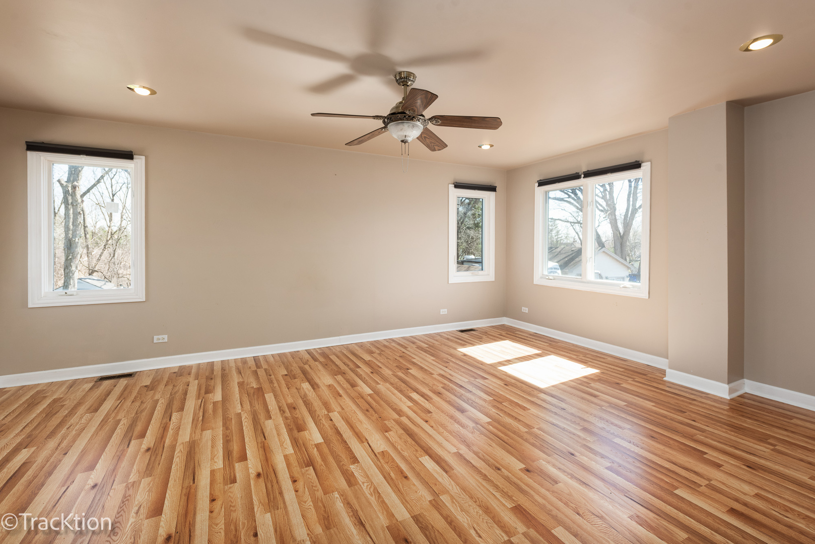 8829 Skyline Drive Burr Ridge, IL 60527 - Photo 15 of 32 wooden floor in an empty room with a window