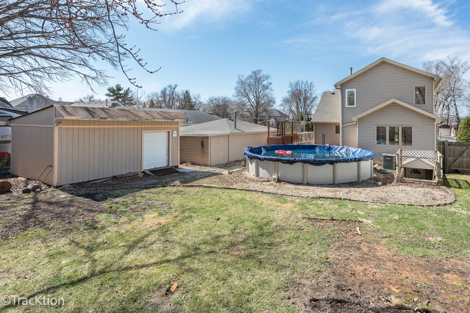 8829 Skyline Drive Burr Ridge, IL 60527 - Photo 26 of 32 a view of a house with backyard and sitting area
