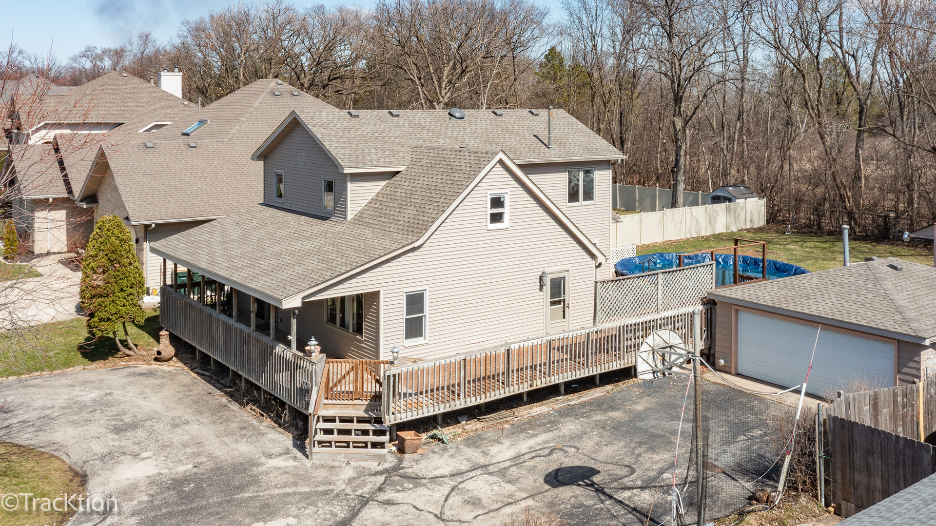 8829 Skyline Drive Burr Ridge, IL 60527 - Photo 27 of 32 a aerial view of a house with a yard