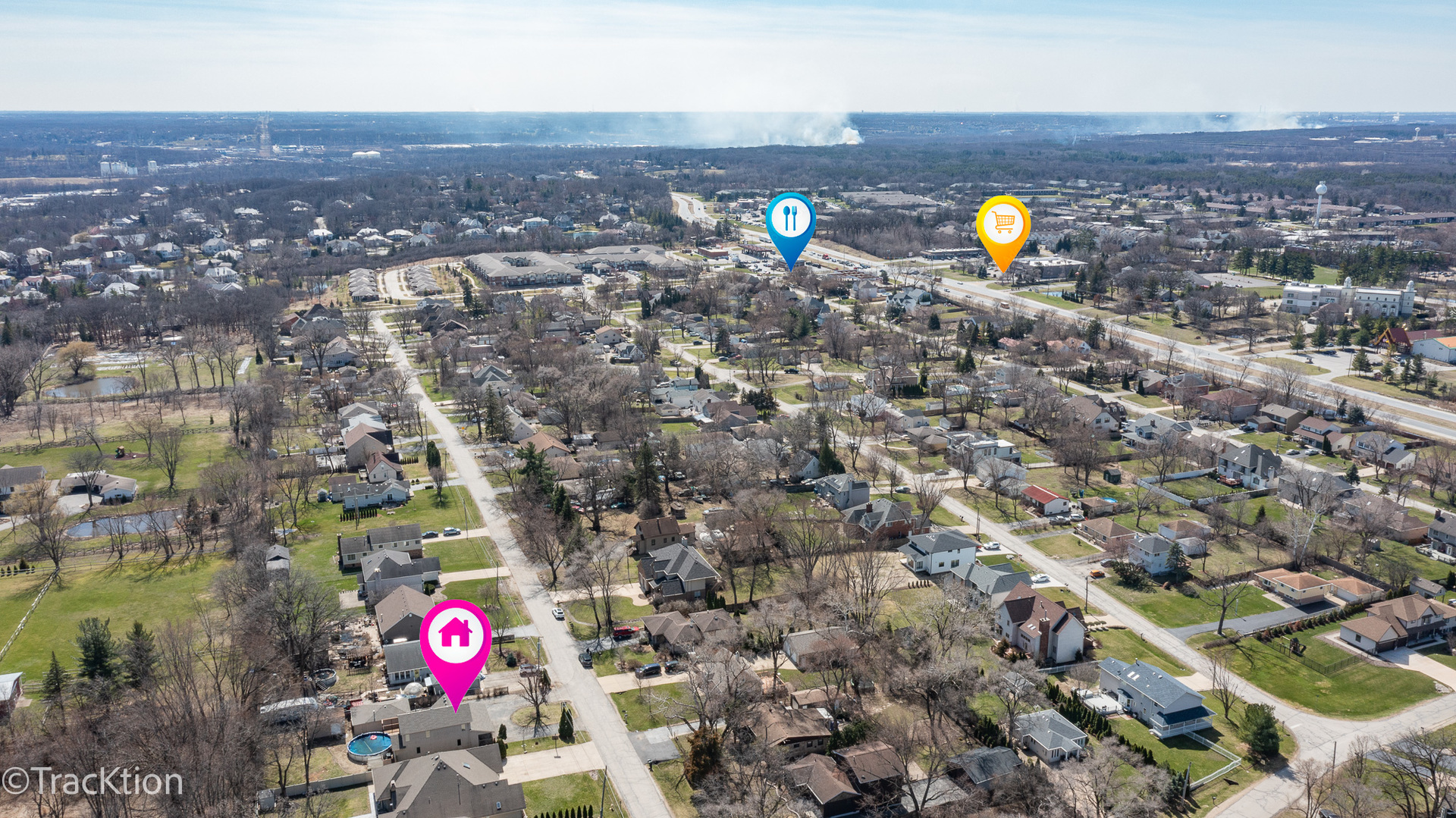 8829 Skyline Drive Burr Ridge, IL 60527 - Photo 31 of 32 an aerial view of a houses with a swimming pool