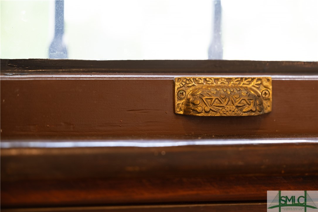 612 Barnard Street Savannah, GA 31401 - Photo 21 of 50 Vintage hardware on windows used to access side porch