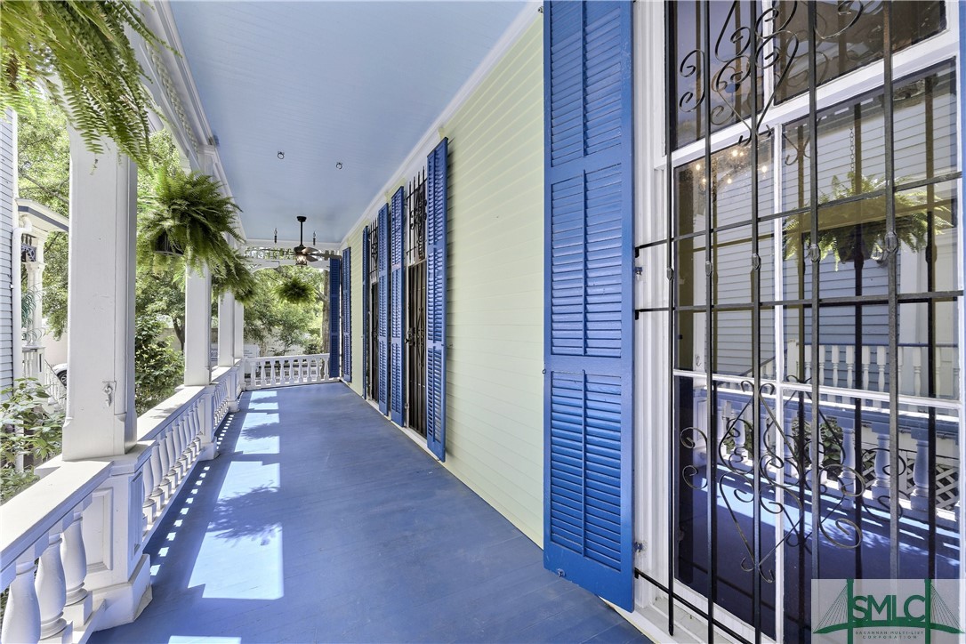 612 Barnard Street Savannah, GA 31401 - Photo 22 of 50 Side porch just waiting for rocking chairs