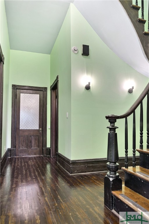 612 Barnard Street Savannah, GA 31401 - Photo 27 of 50 Spiral rear staircase with vintage glass door