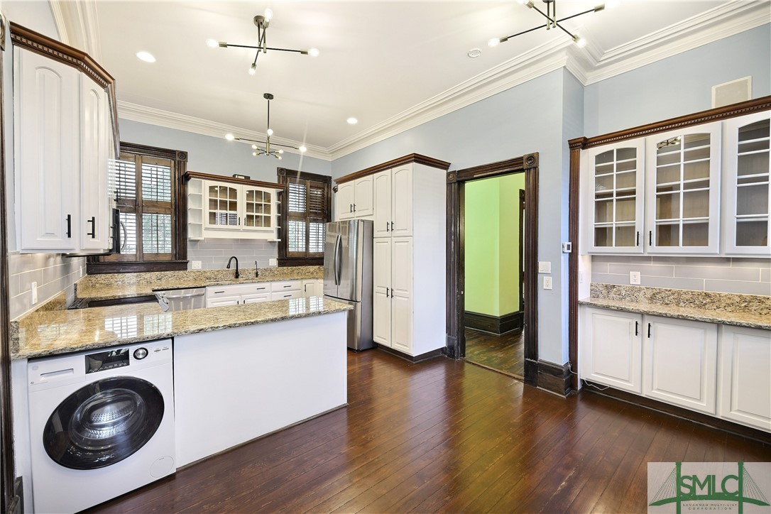 612 Barnard Street Savannah, GA 31401 - Photo 28 of 50 Renovated kitchen with all new appliances and washer dryer combo