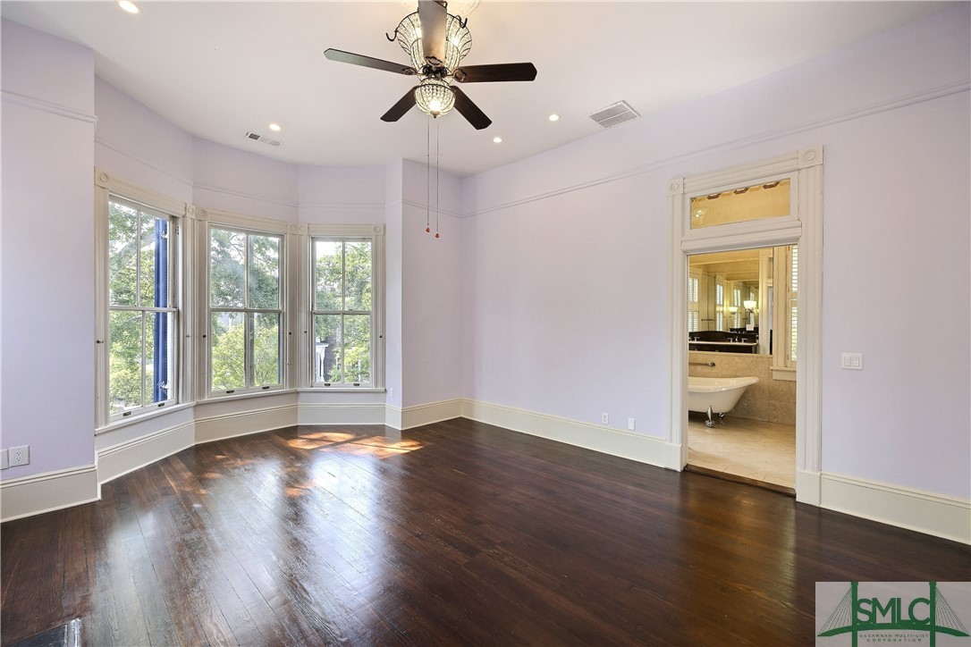 612 Barnard Street Savannah, GA 31401 - Photo 43 of 50 Primary bedroom with a beautiful street view of Barnard St