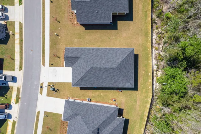 aerial view of a house with a swimming pool
