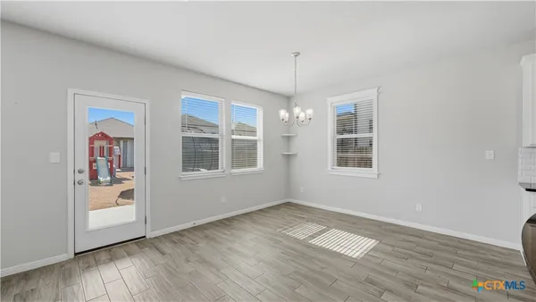 a view of livingroom with hardwood floor and window