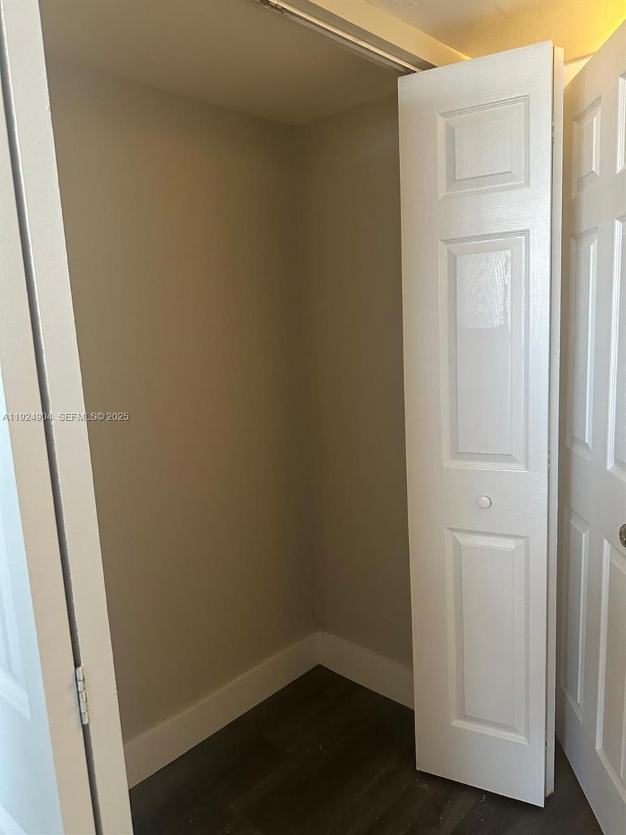 6770 Indian Creek Drive, Unit 6C Miami Beach, FL 33141 - Photo 17 of 19 a view of small space with wooden floor