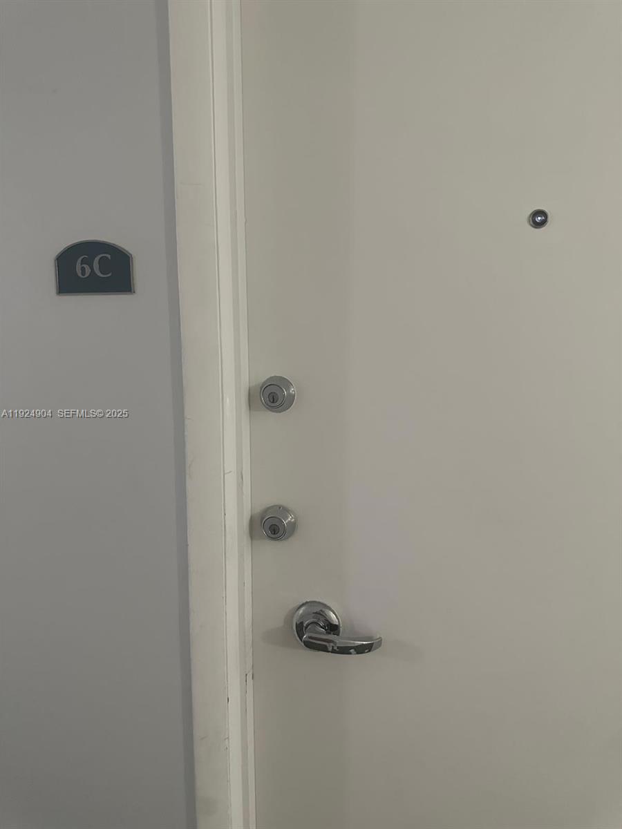 6770 Indian Creek Drive, Unit 6C Miami Beach, FL 33141 - Photo 18 of 19 a bathroom with a shower