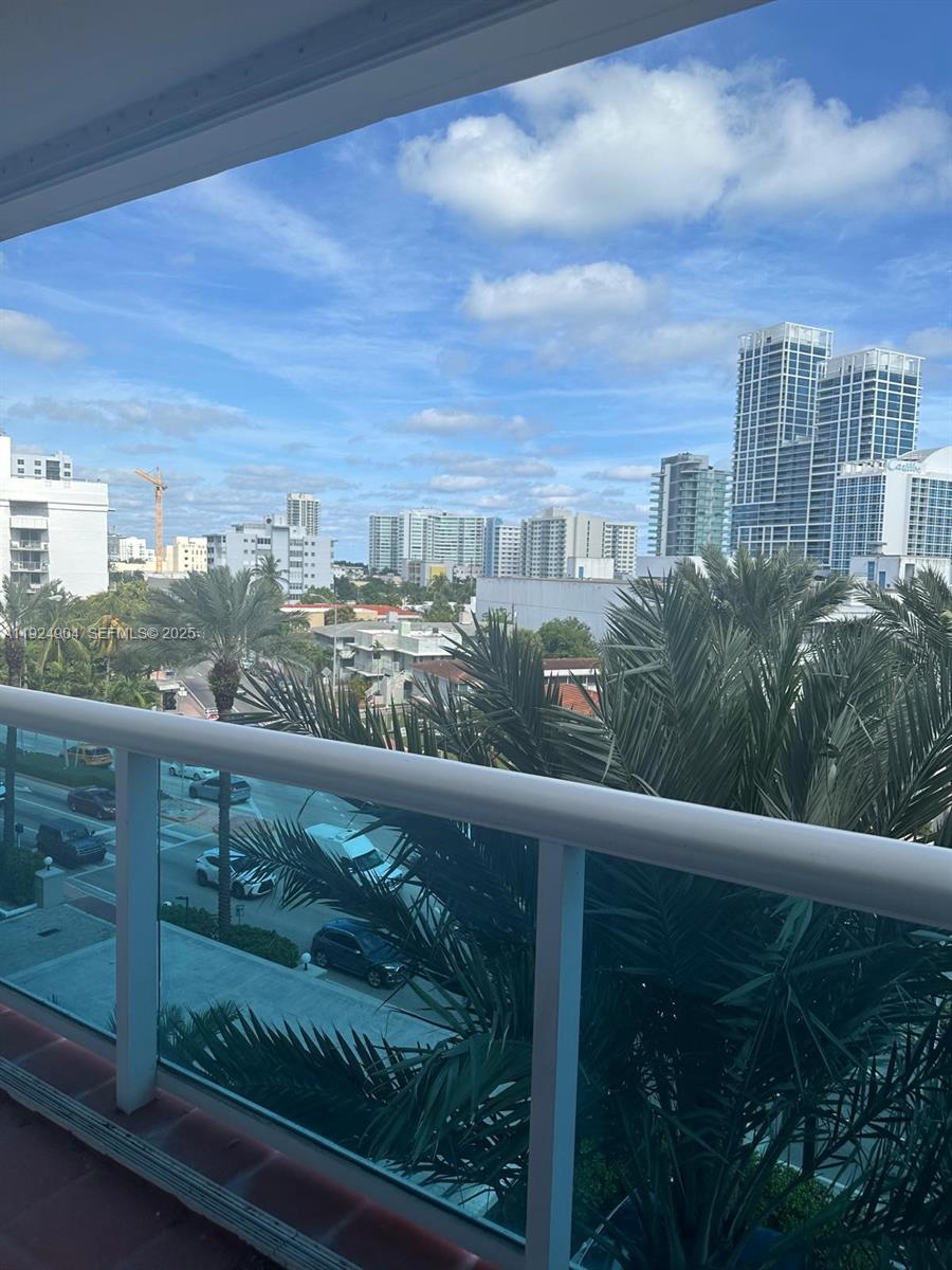 6770 Indian Creek Drive, Unit 6C Miami Beach, FL 33141 - Photo 3 of 19 a view of a city from a balcony