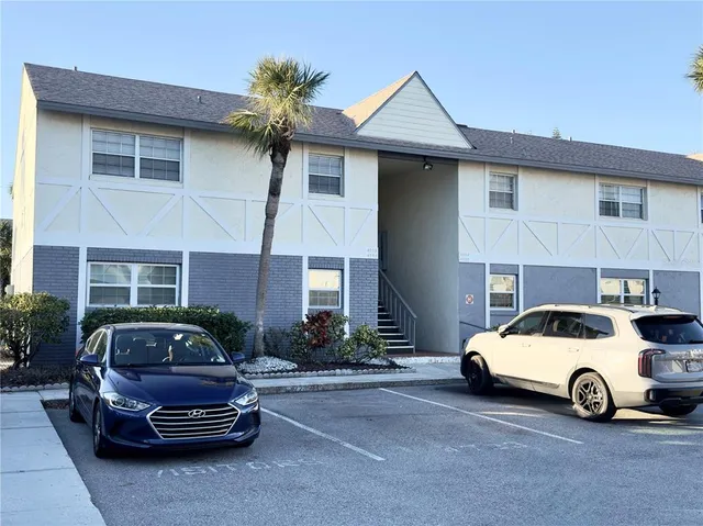 a car parked in front of a house
