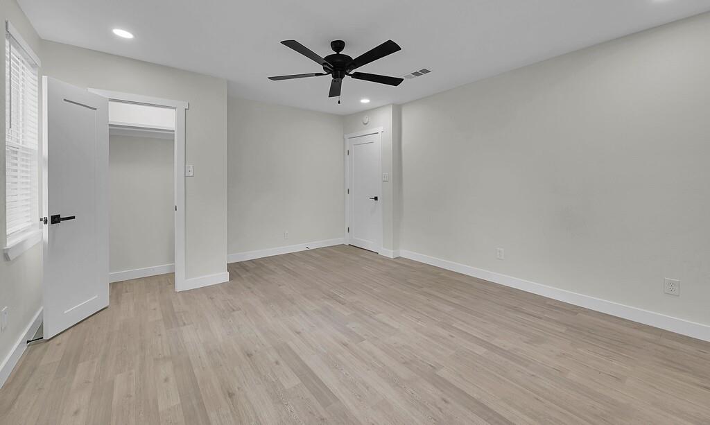 1713 Reuter Avenue Waco, TX 76708 - Photo 20 of 34 Unfurnished bedroom with light wood-style flooring, recessed lighting, baseboards, and a ceiling fan