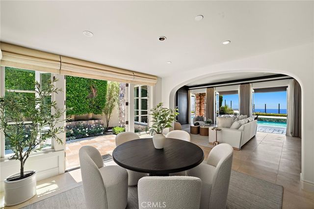 a spacious bathroom with a bathtub sink and mirror