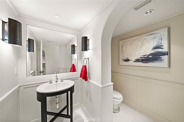 a view of a house with backyard porch and sitting area