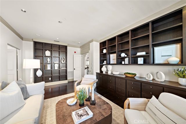 a view of a patio with chairs and a yard