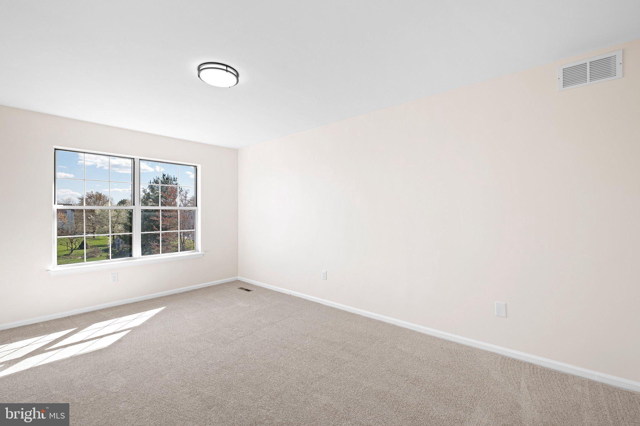 1050 Old Forge Road New Castle, DE 19720 - Photo 17 of 25 a view of an empty room with a window