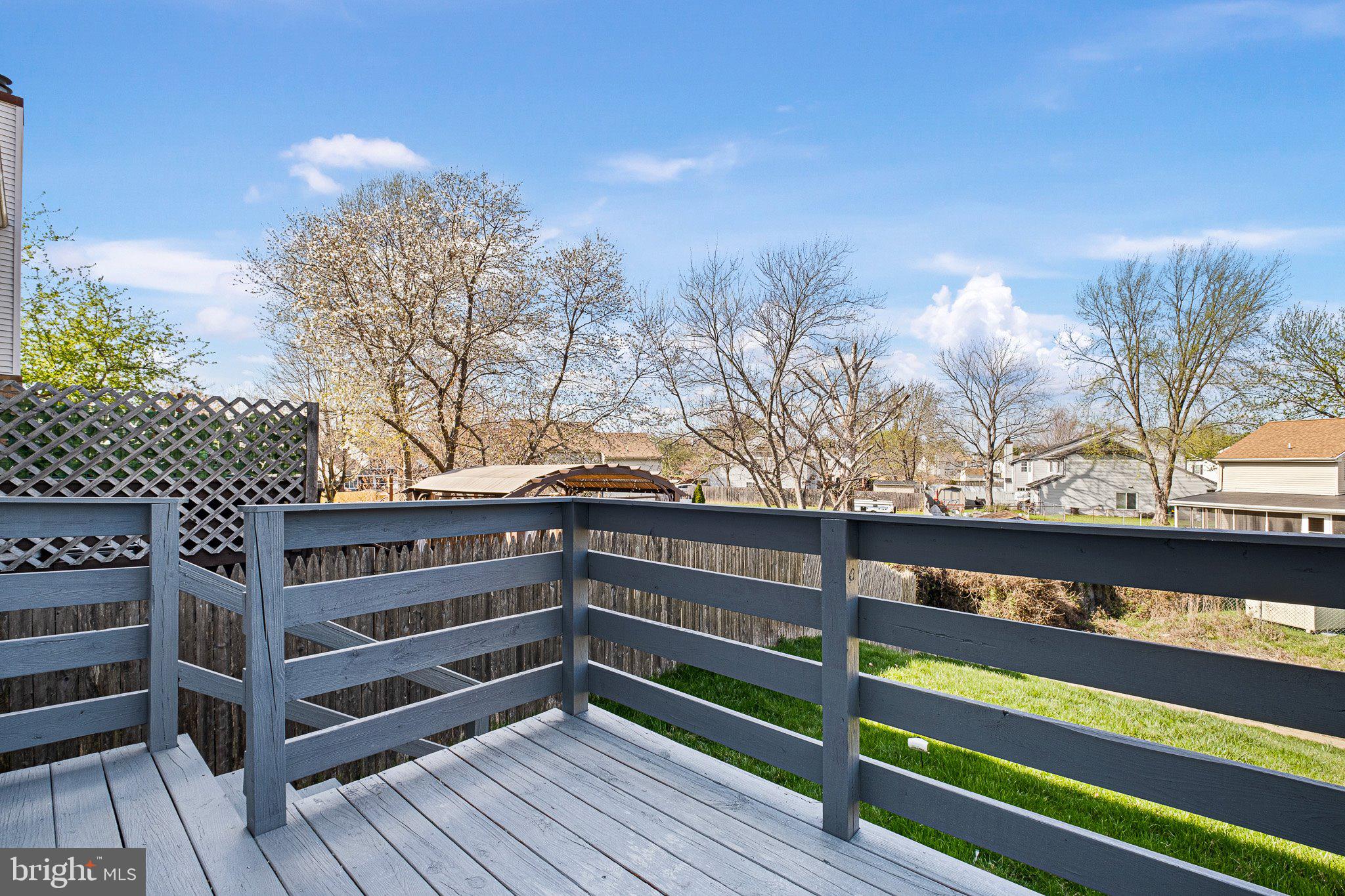 1050 Old Forge Road New Castle, DE 19720 - Photo 24 of 25 a view of a wooden balcony and outdoor space