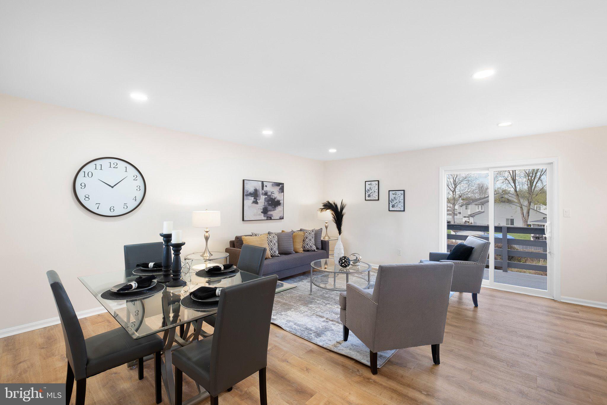 1050 Old Forge Road New Castle, DE 19720 - Photo 5 of 25 a living room with fireplace furniture and a window