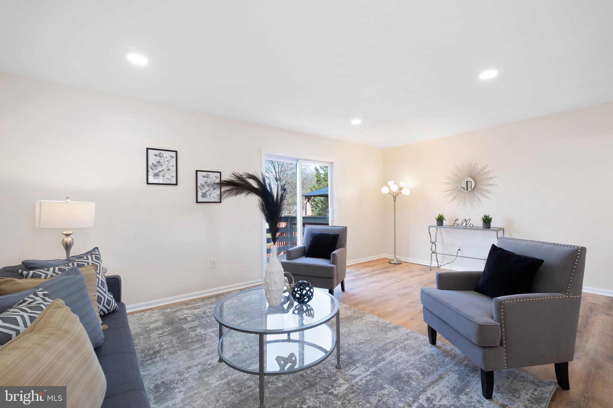 1050 Old Forge Road New Castle, DE 19720 - Photo 6 of 25 a living room with furniture and a couch