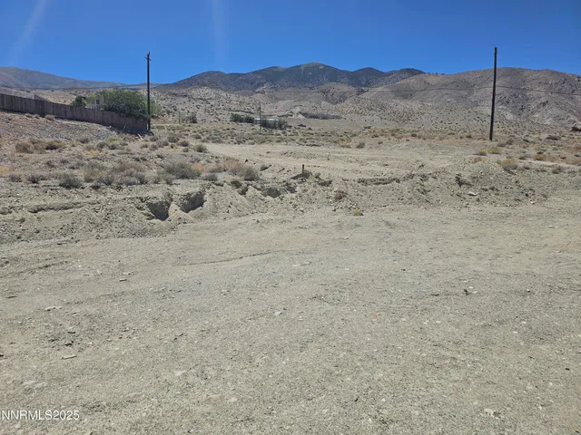 a view of ocean with a mountain