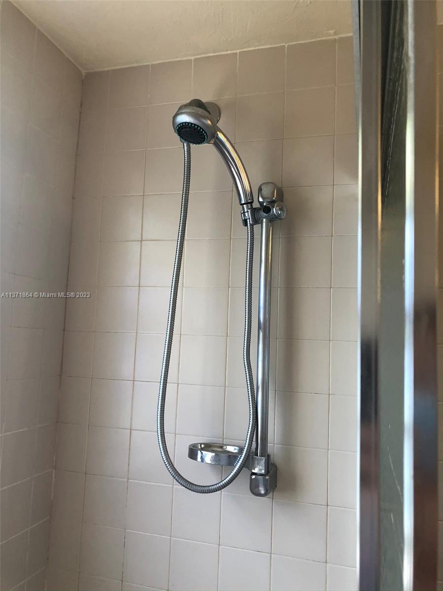 12902 Southwest 88th Terrace, Unit B201 Miami, FL 33186 - Photo 41 of 49 a bathroom with a shower