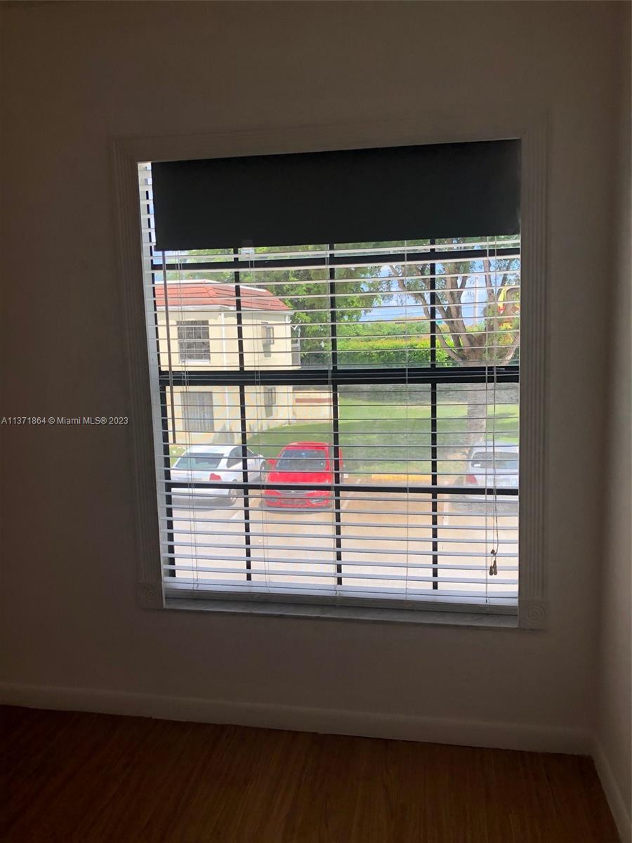 12902 Southwest 88th Terrace, Unit B201 Miami, FL 33186 - Photo 44 of 49 a view of empty room with windows