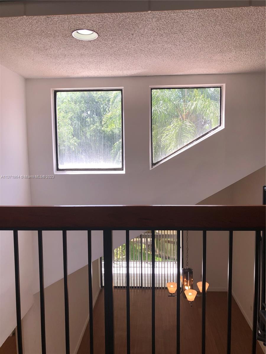 12902 Southwest 88th Terrace, Unit B201 Miami, FL 33186 - Photo 7 of 49 a view of an outdoor space and balcony