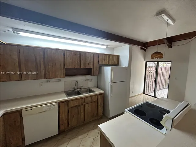 a sign on the side of a street