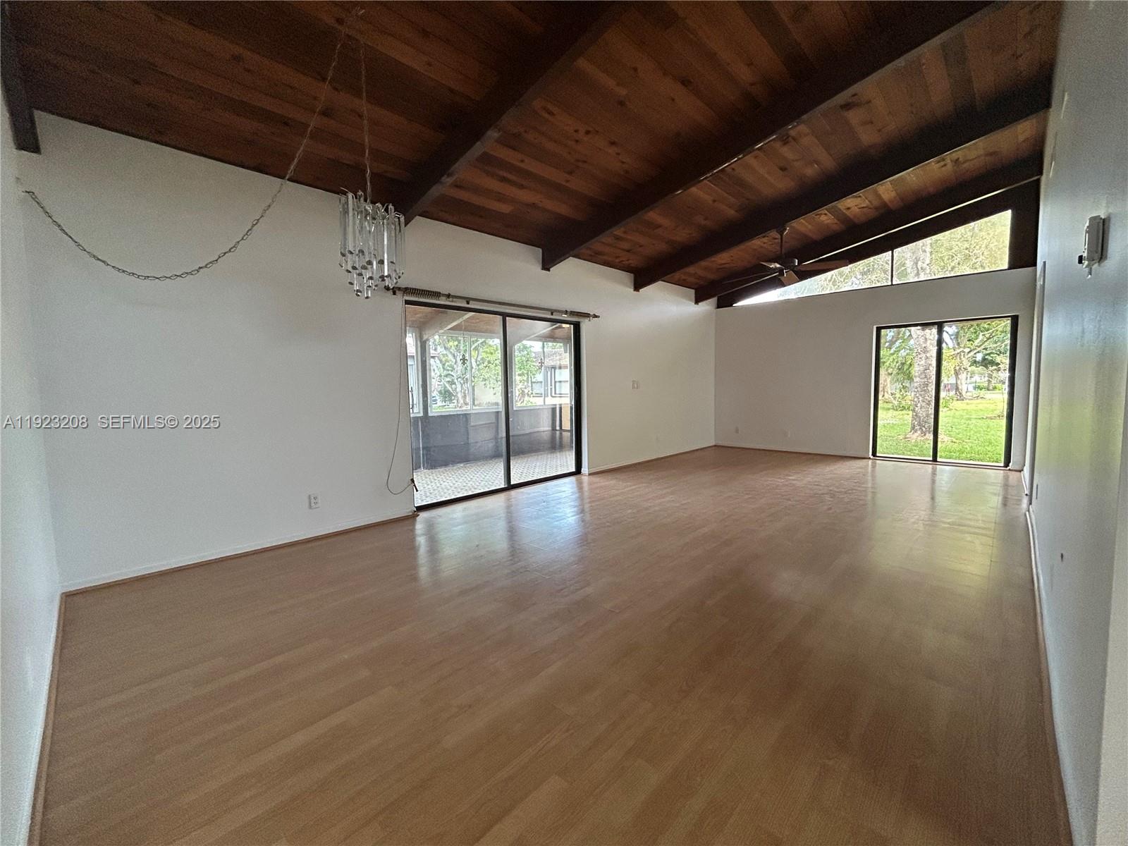 534 Briarwood Circle, Unit 148 Hollywood, FL 33024 - Photo 14 of 40 a view of an empty room with glass door