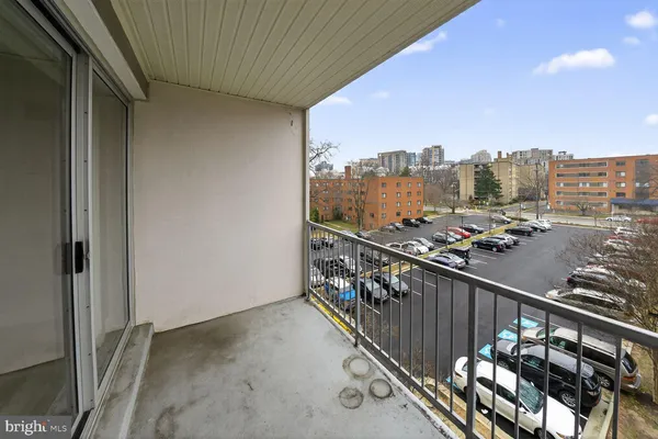 a view of a balcony with city view