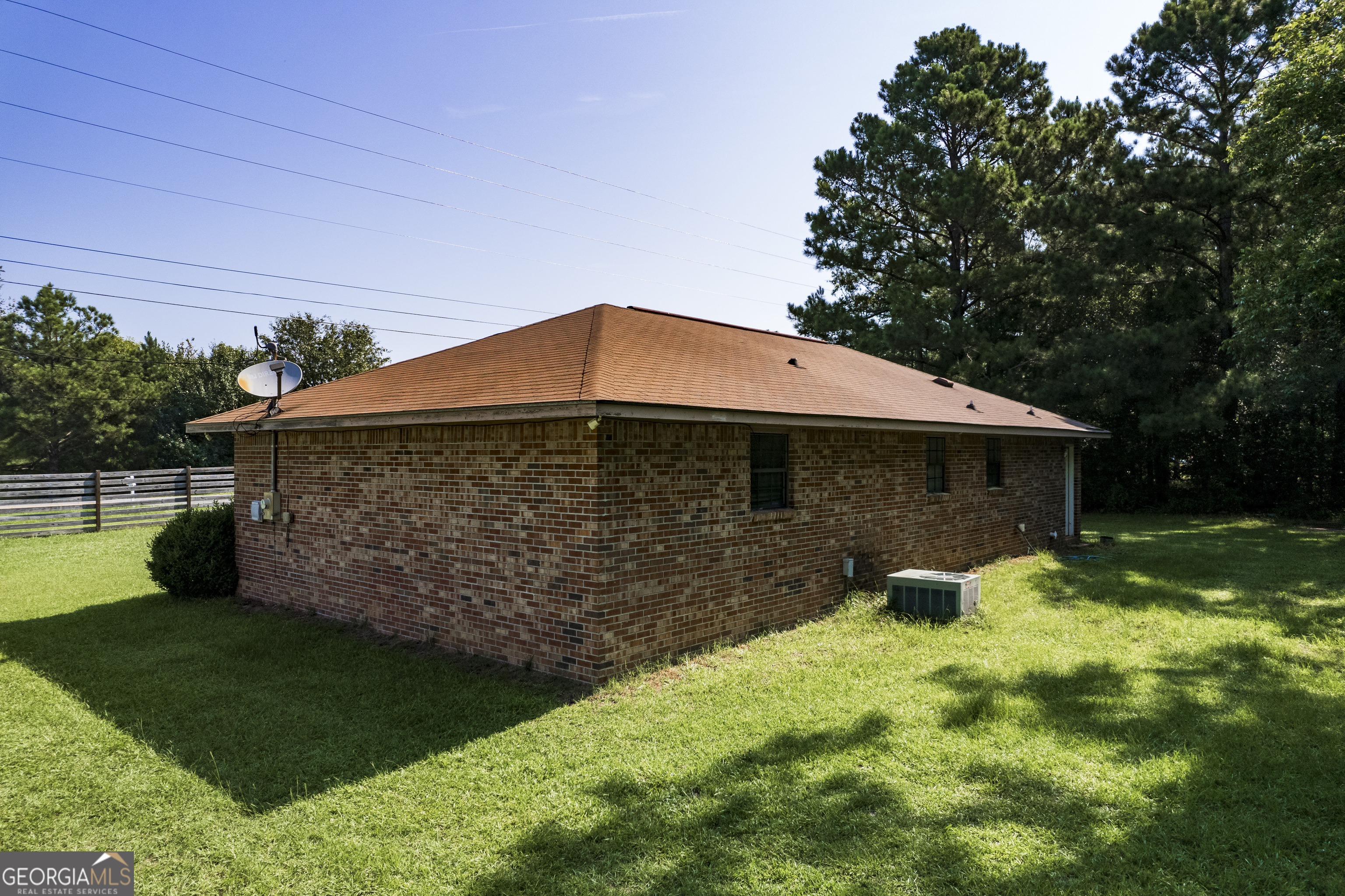 735 River Road Fort Valley, GA 31030 - Photo 3 of 10 a front view of a house with garden