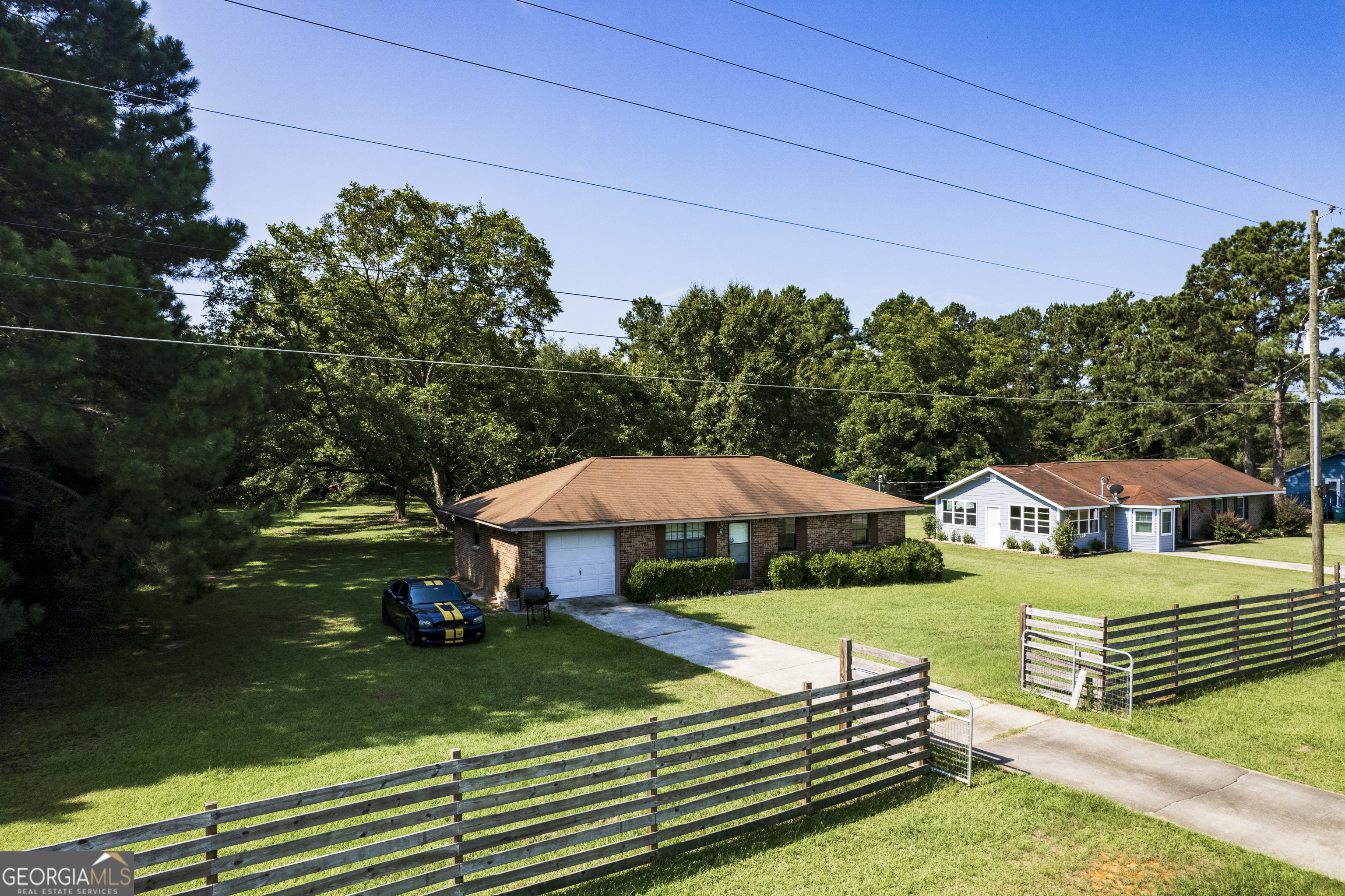 735 River Road Fort Valley, GA 31030 - Photo 5 of 10 a view of a house with garden space and sitting area