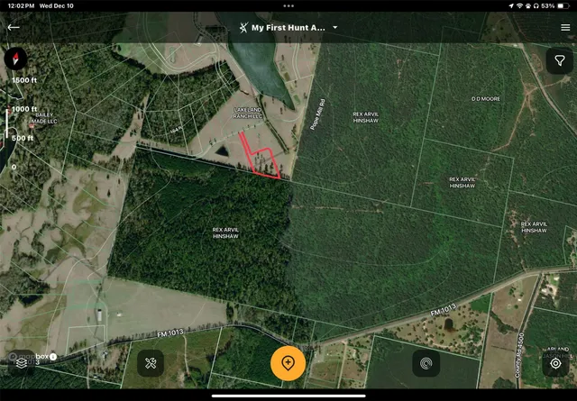 an aerial view of a wooden house