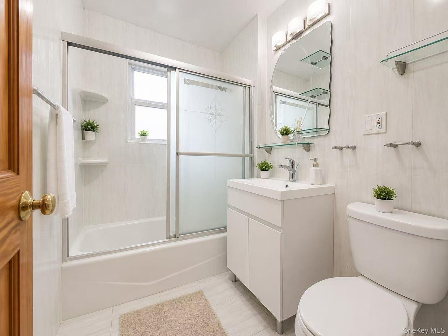 75-01 167th Street Queens, NY 11366 - Photo 3 of 10 a bathroom with a sink toilet and shower