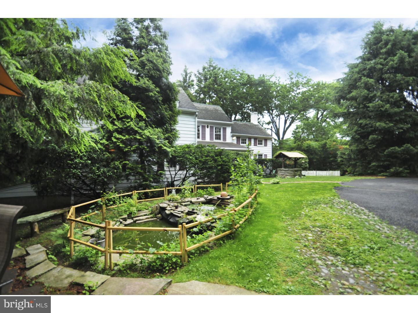 7708 Oak Lane Road Cheltenham, PA 19012 - Photo 2 of 32 Front Yard with gorgeous fish pond