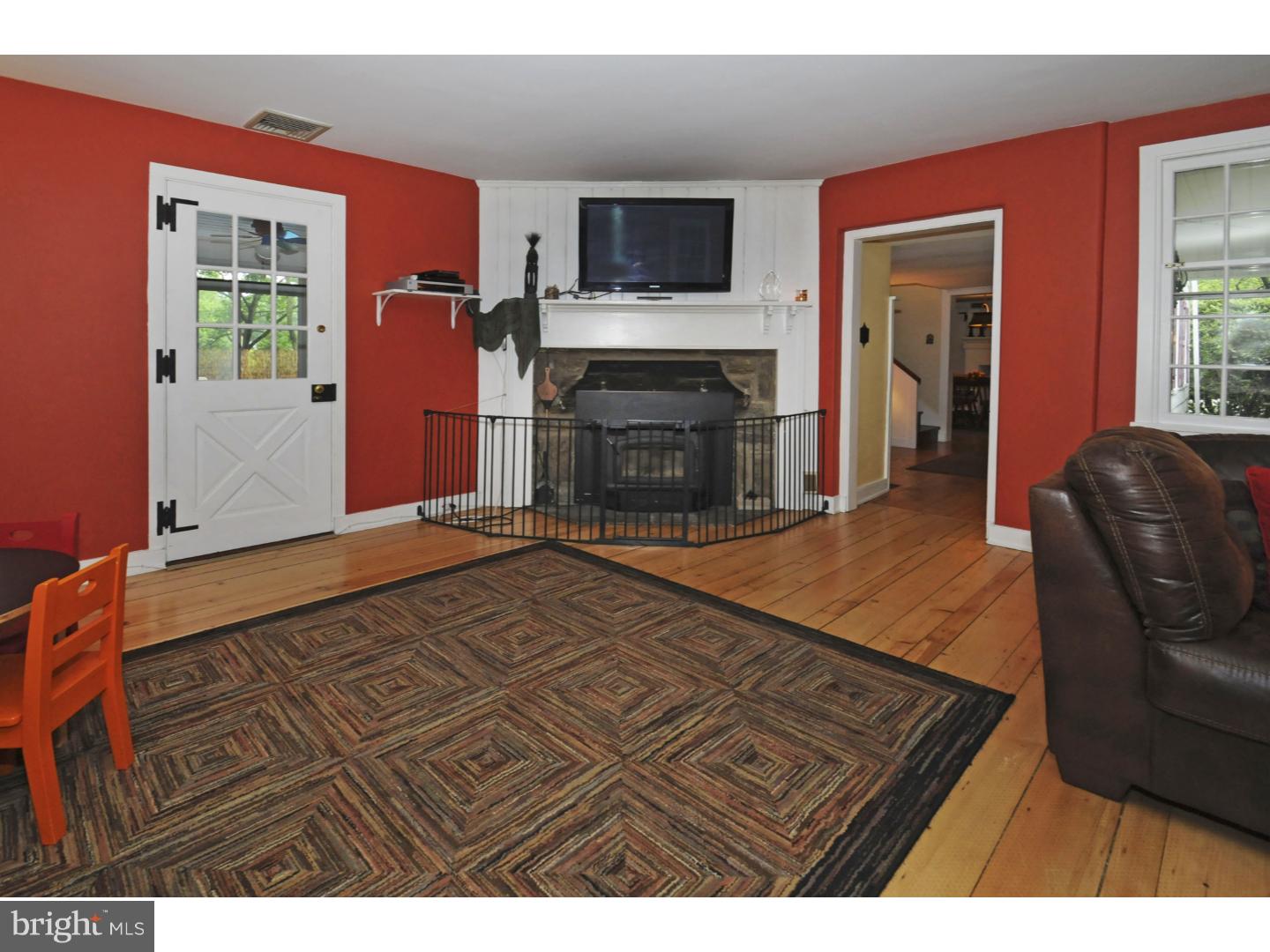 7708 Oak Lane Road Cheltenham, PA 19012 - Photo 11 of 32 Great Room features a wood-burning fireplace