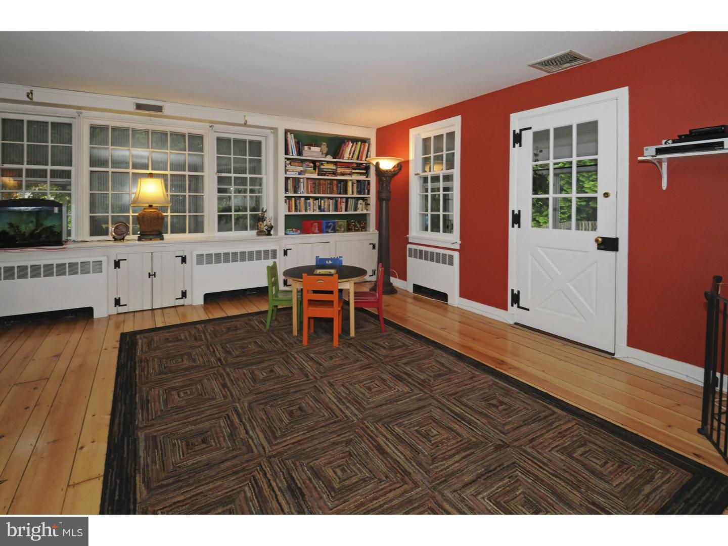 7708 Oak Lane Road Cheltenham, PA 19012 - Photo 13 of 32 Great Room with built-in cabinets and shelving