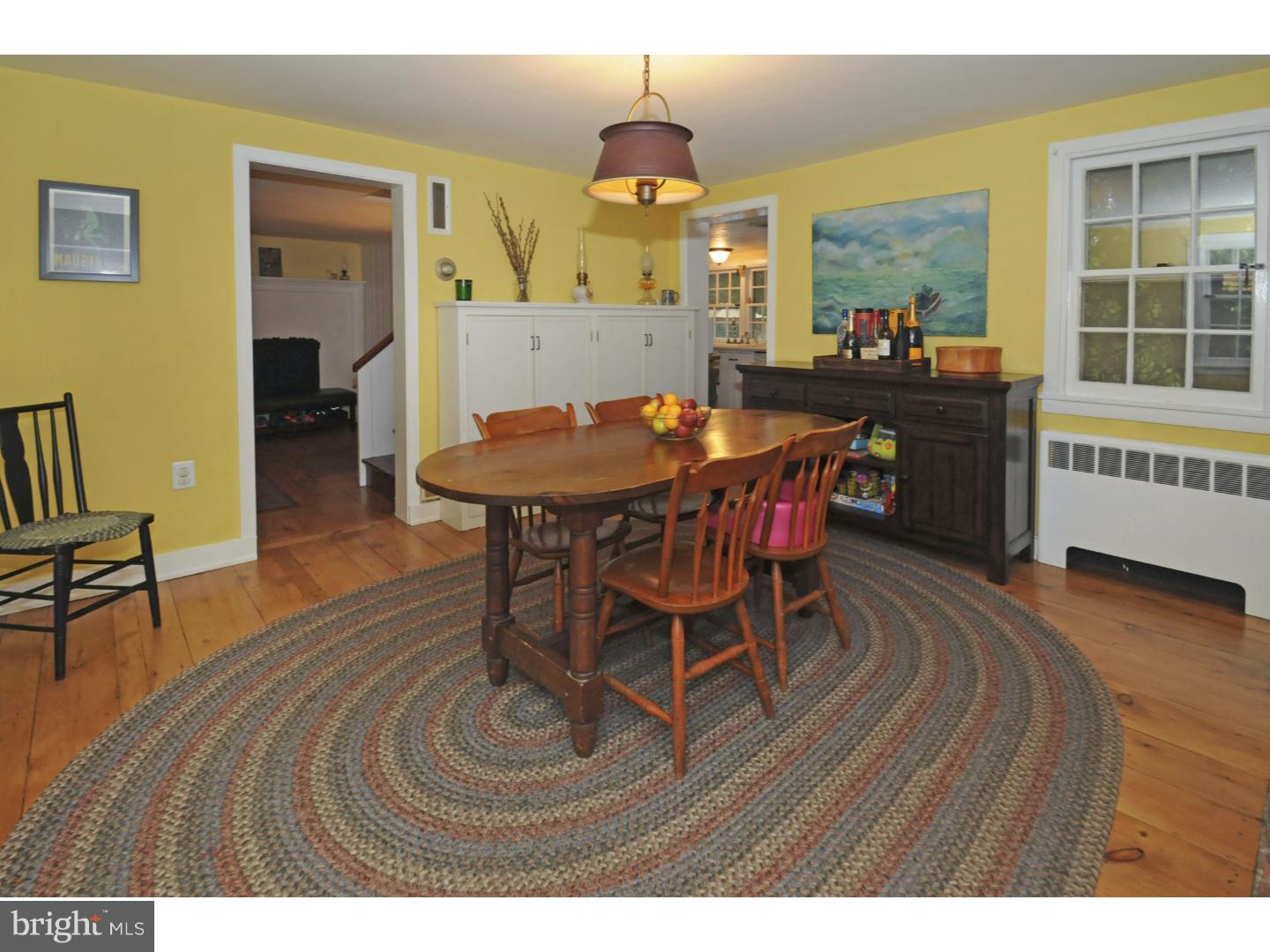7708 Oak Lane Road Cheltenham, PA 19012 - Photo 14 of 32 Dining Room with wood-burning fireplace