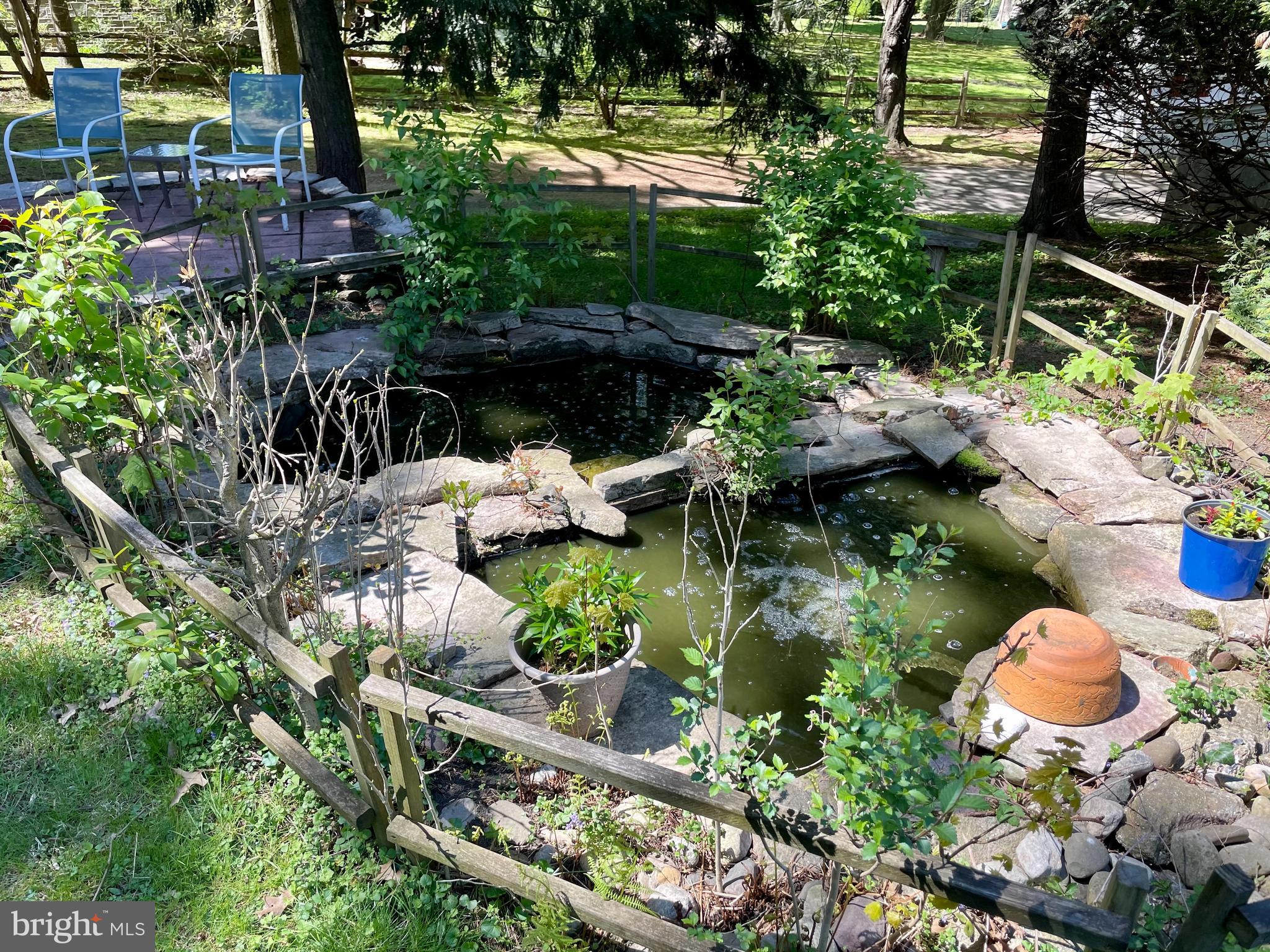 7708 Oak Lane Road Cheltenham, PA 19012 - Photo 3 of 32 Soothing fish pond and patio