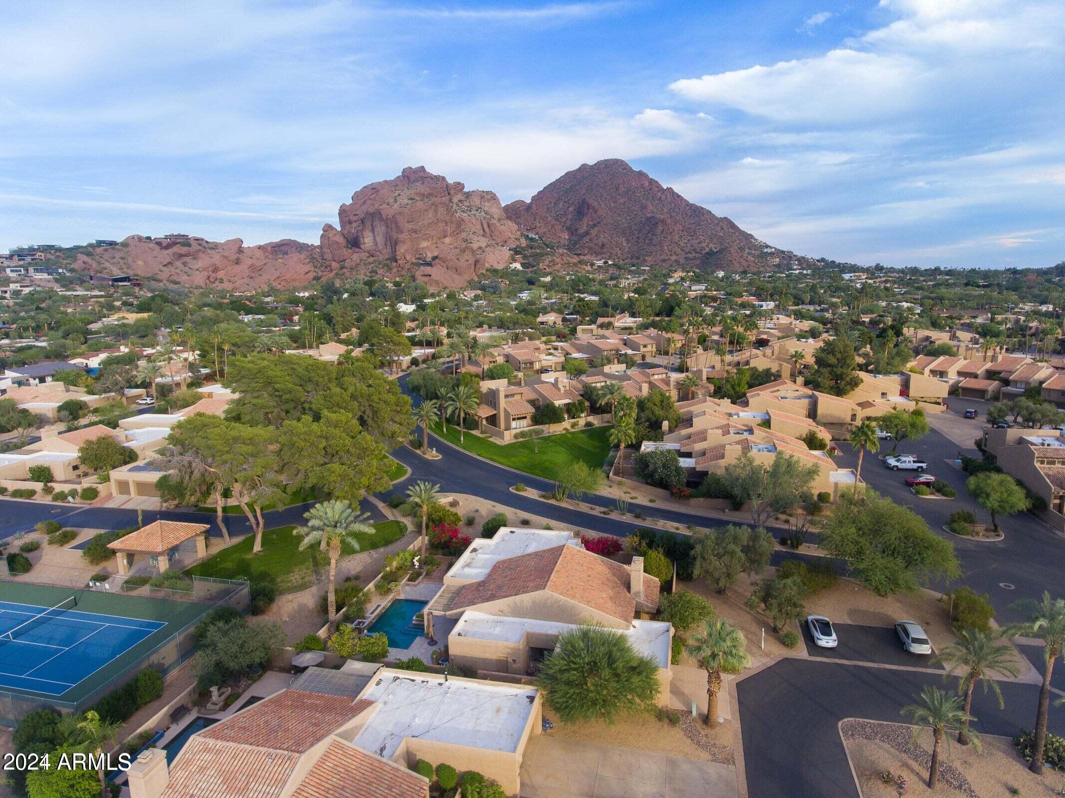 4440 East Camelback Road, Unit 32 Phoenix, AZ 85018 - Photo 4 of 7 an aerial view of a city with lots of residential buildings