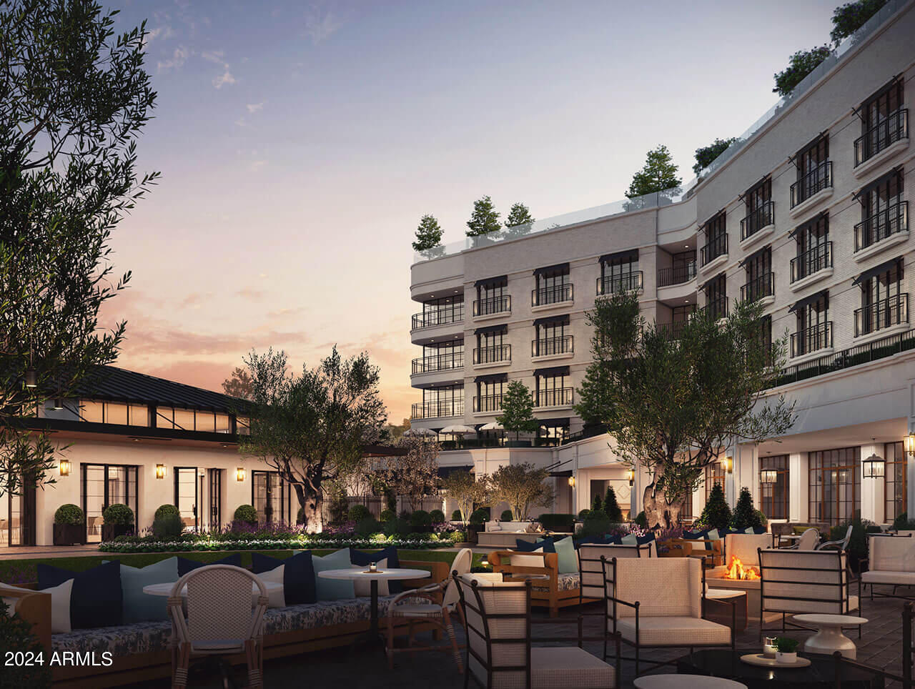 4440 East Camelback Road, Unit 32 Phoenix, AZ 85018 - Photo 7 of 7 a front view of a building with outdoor space and seating area