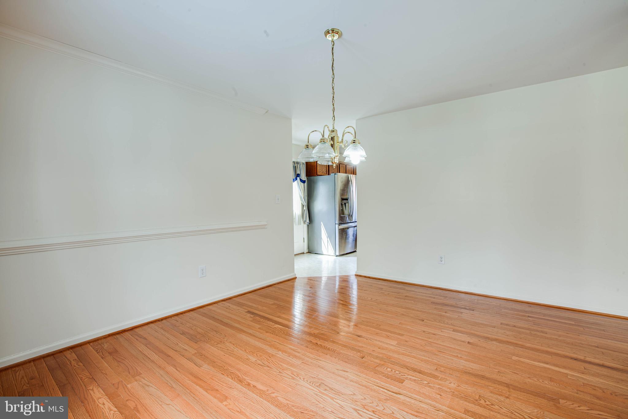 750 Poplar Road Stafford, VA 22556 - Photo 13 of 60 Dining Room with Chair & Crown Molding