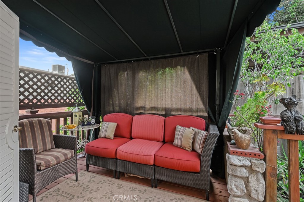 315 Old Ranch Road Sierra Madre, CA 91024 - Photo 16 of 42 a outdoor living space with furniture and a fireplace